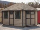 10x14 Hip Roofline Storage Shed With Clay Horizontal Shiplap Siding, Bronze Trim, and Avocado Shutters